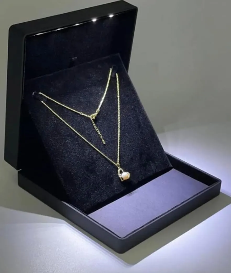 - YJCBOX Elegant LED Light Necklace Box ?C Luxury Gift Holder for Jewelry, Weddings, astonish consult troupe Anniversaries, and Storage (Black) 